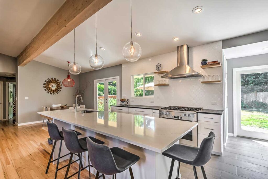 Custom kitchen remodel with island and shaker cabinetry